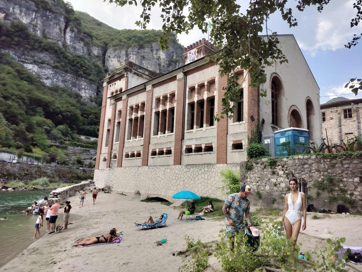 The abandoned Guarnieri hydroelectric power station and river beach at Carpanè